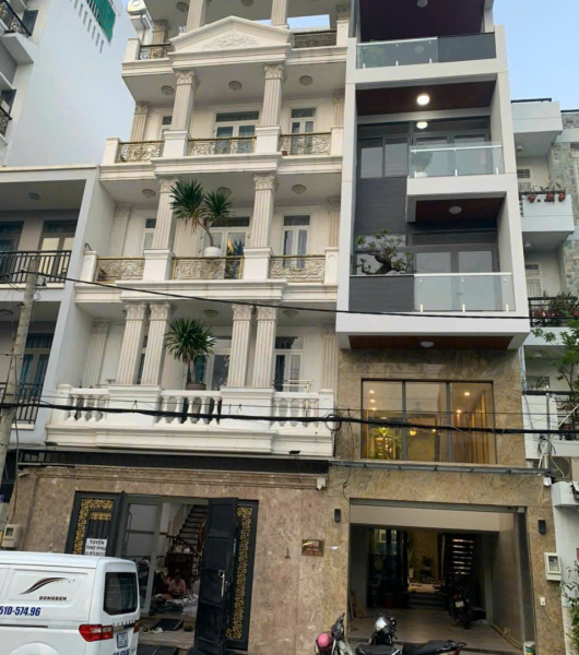 Thi công kính nhà phố